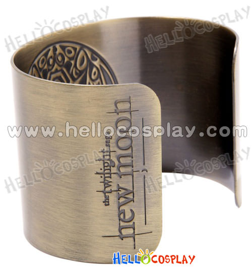 Polished brass-tone cuff features the wolf pack tribe tattoo.